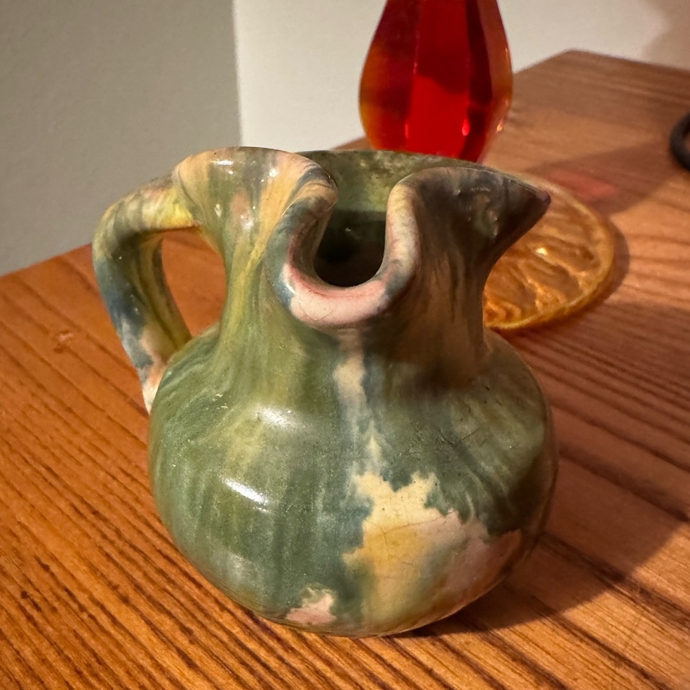 Williamsburg Pottery handmade small pitcher/vase. 2 1/2” tall x 3” at widest.